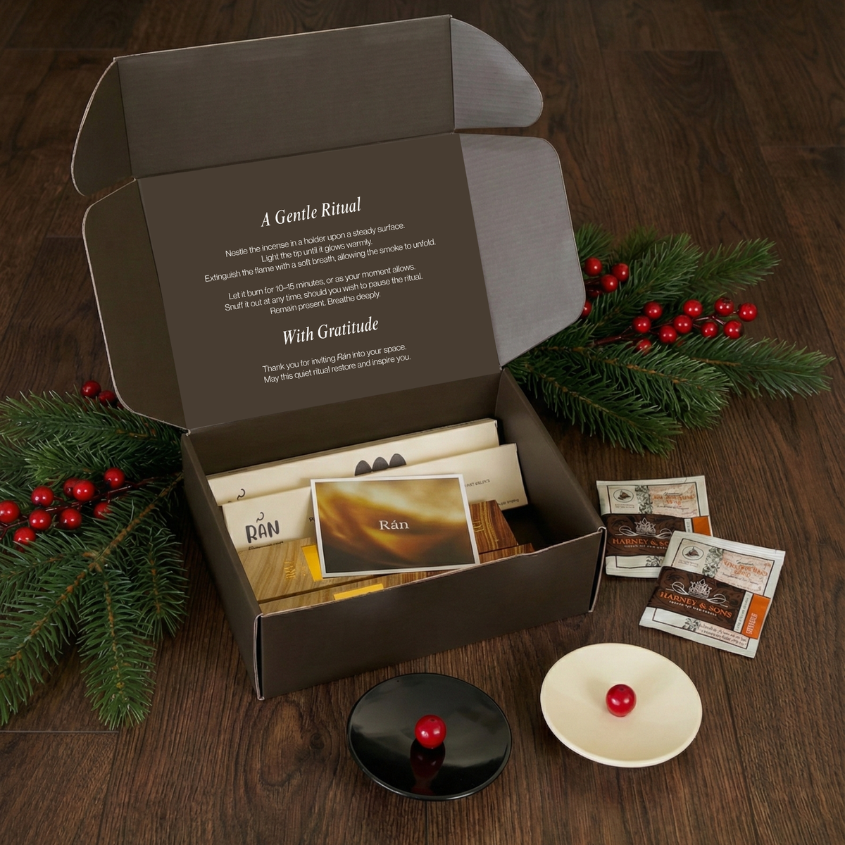 Open Rán incense gift box with holders, Harney & Sons tea and card, styled for Christmas